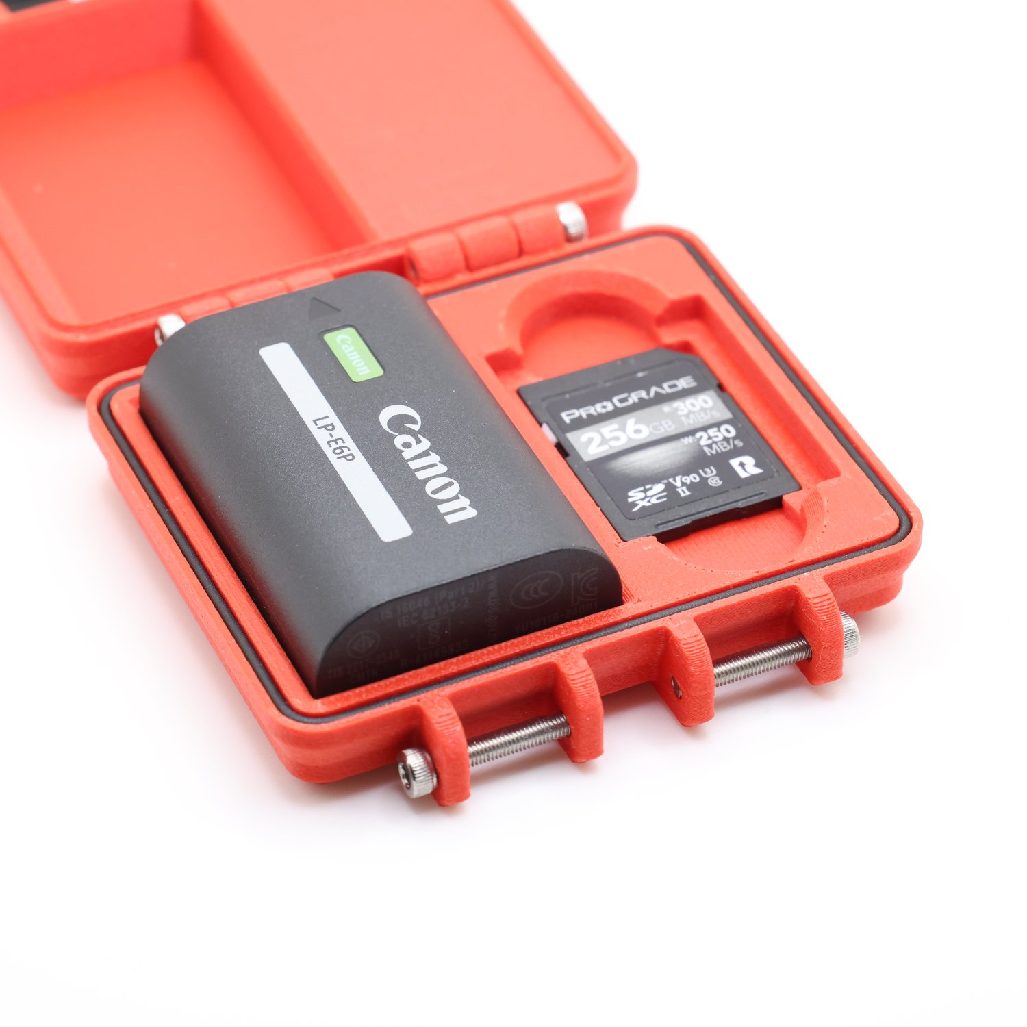 Akku-und Speicherkartenbox für Canon Single (1 x LP-6 +   CFEB / SD)  Akku-/Kartenbox (rot)  Canon Single Box - BigLensCap: Canon Single Box